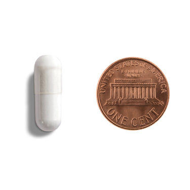 Capsule being compared to the size of a penny